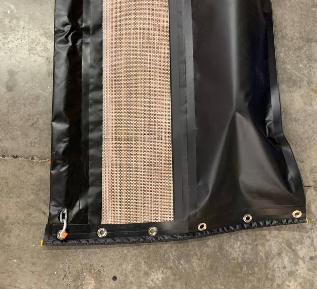 containment boom with permeable skirt containment boom with permeable skirt